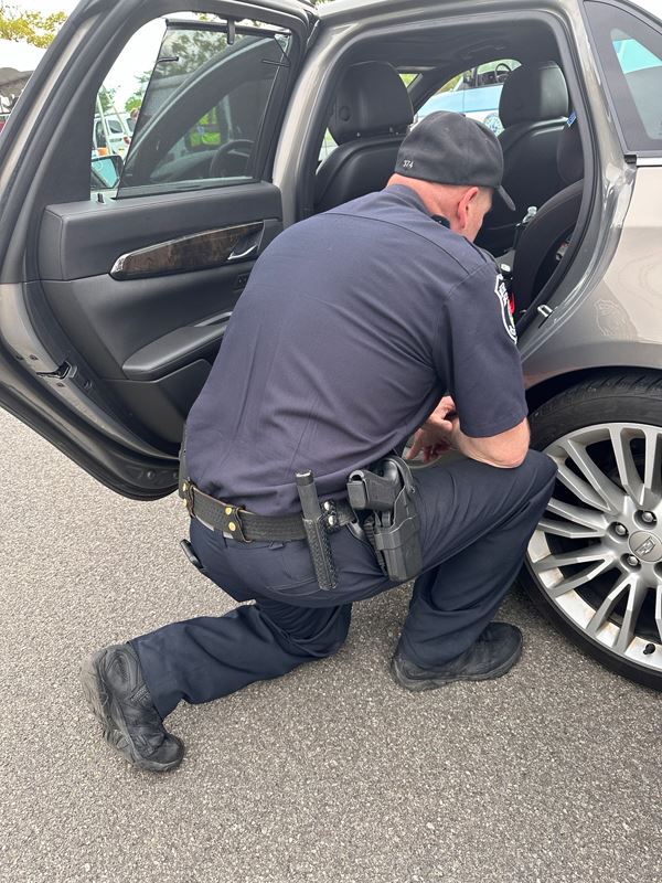 BPD-Car-Seats-Officer-Austin-Installing-Seat